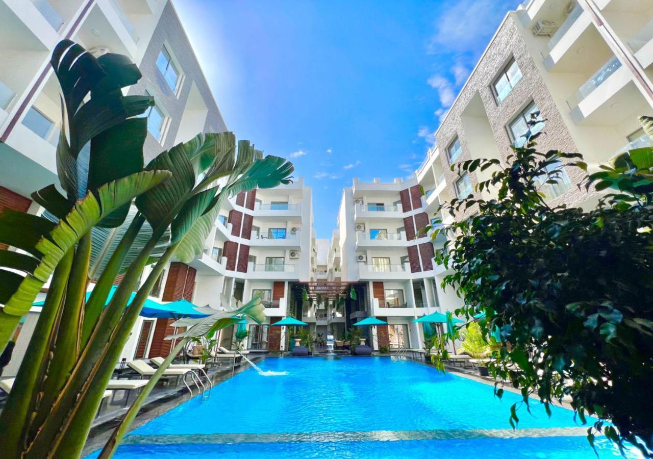 Sanctuary Sunlit Hurghada Haven With 4 Pools, Rooftop Sunsets & Gourmet Bites Steps Away Buitenkant foto