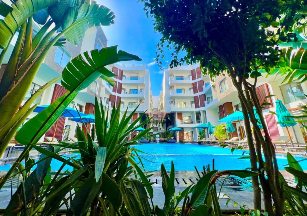 Sanctuary Sunlit Hurghada Haven With 4 Pools, Rooftop Sunsets & Gourmet Bites Steps Away Buitenkant foto
