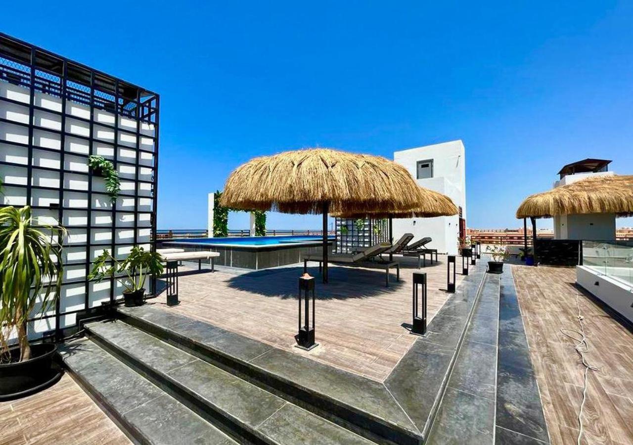 Sanctuary Sunlit Hurghada Haven With 4 Pools, Rooftop Sunsets & Gourmet Bites Steps Away Buitenkant foto